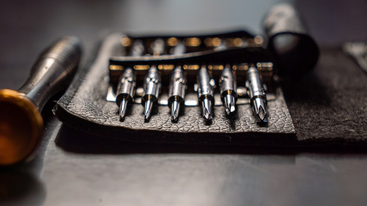 Close-up of plumbing valves and manifold connectors