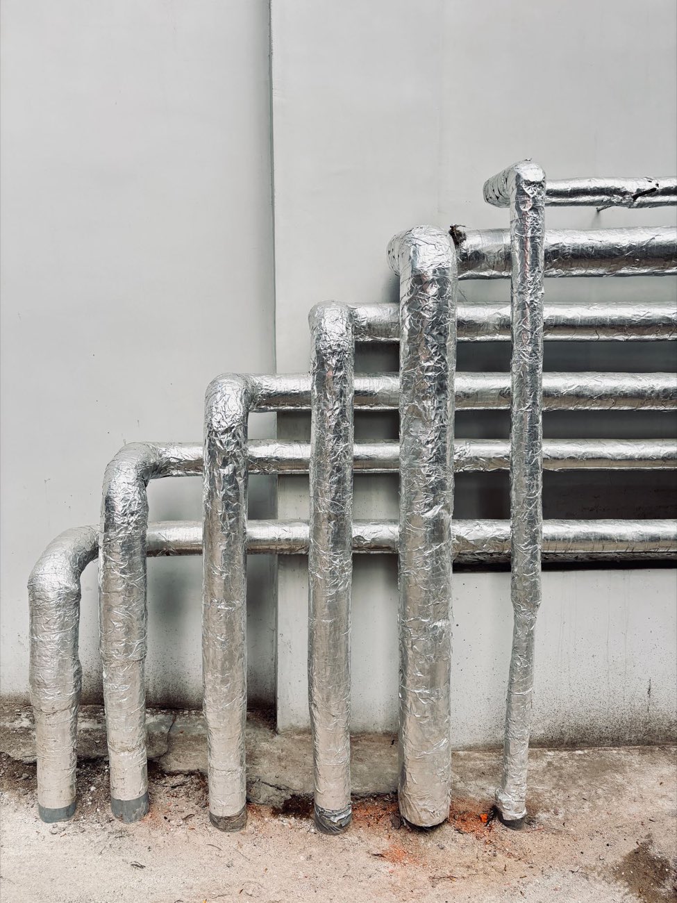 Vertical riser pipe stacks in a highrise mechanical shaft