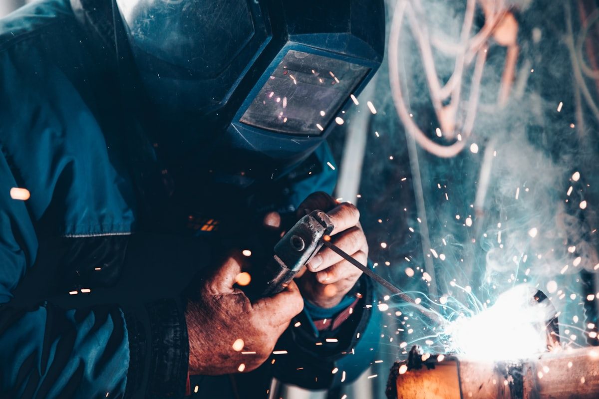 Licensed tradesperson at work on pipe and mechanical systems